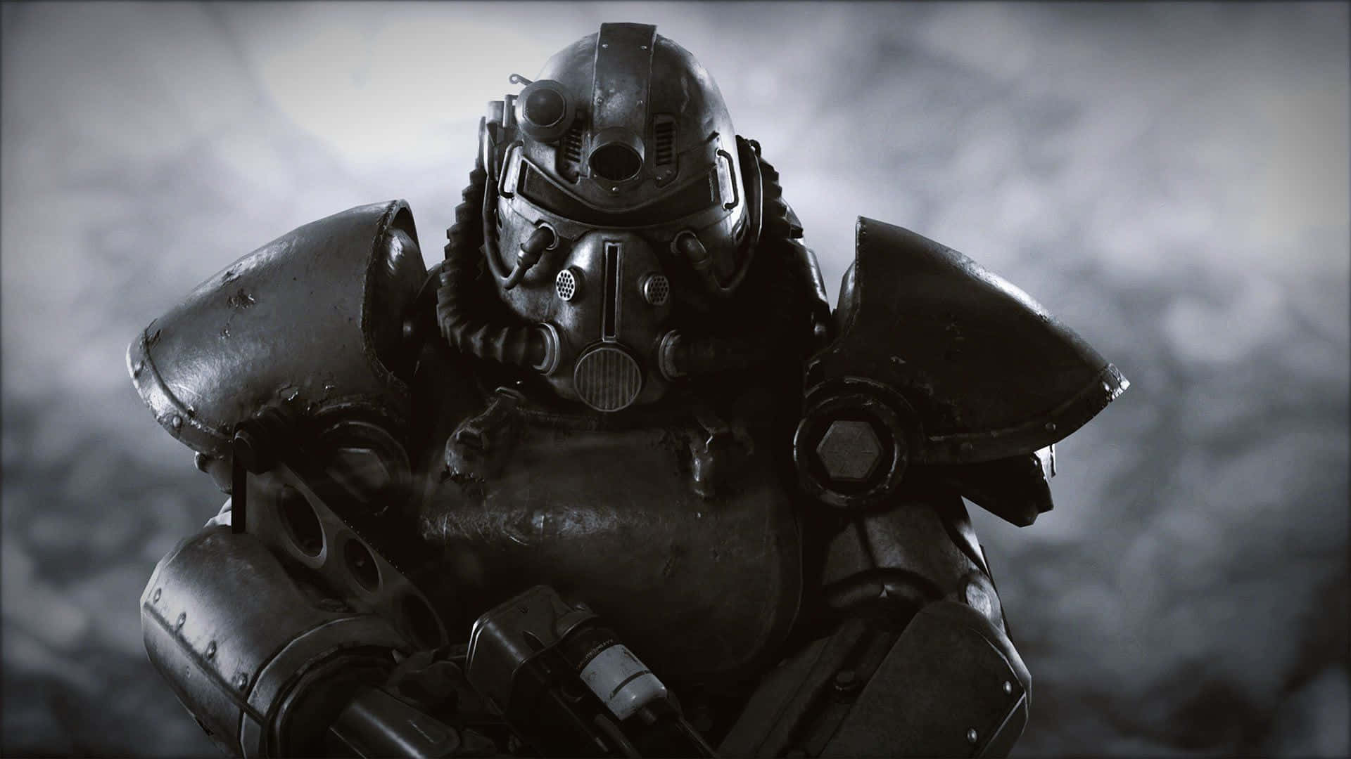 Fallout Enclave 桌布 壁紙 — 一名身穿重型動力裝甲的士兵站在煙霧瀰漫的灰色環境中，帶有粗糙的金屬質感。