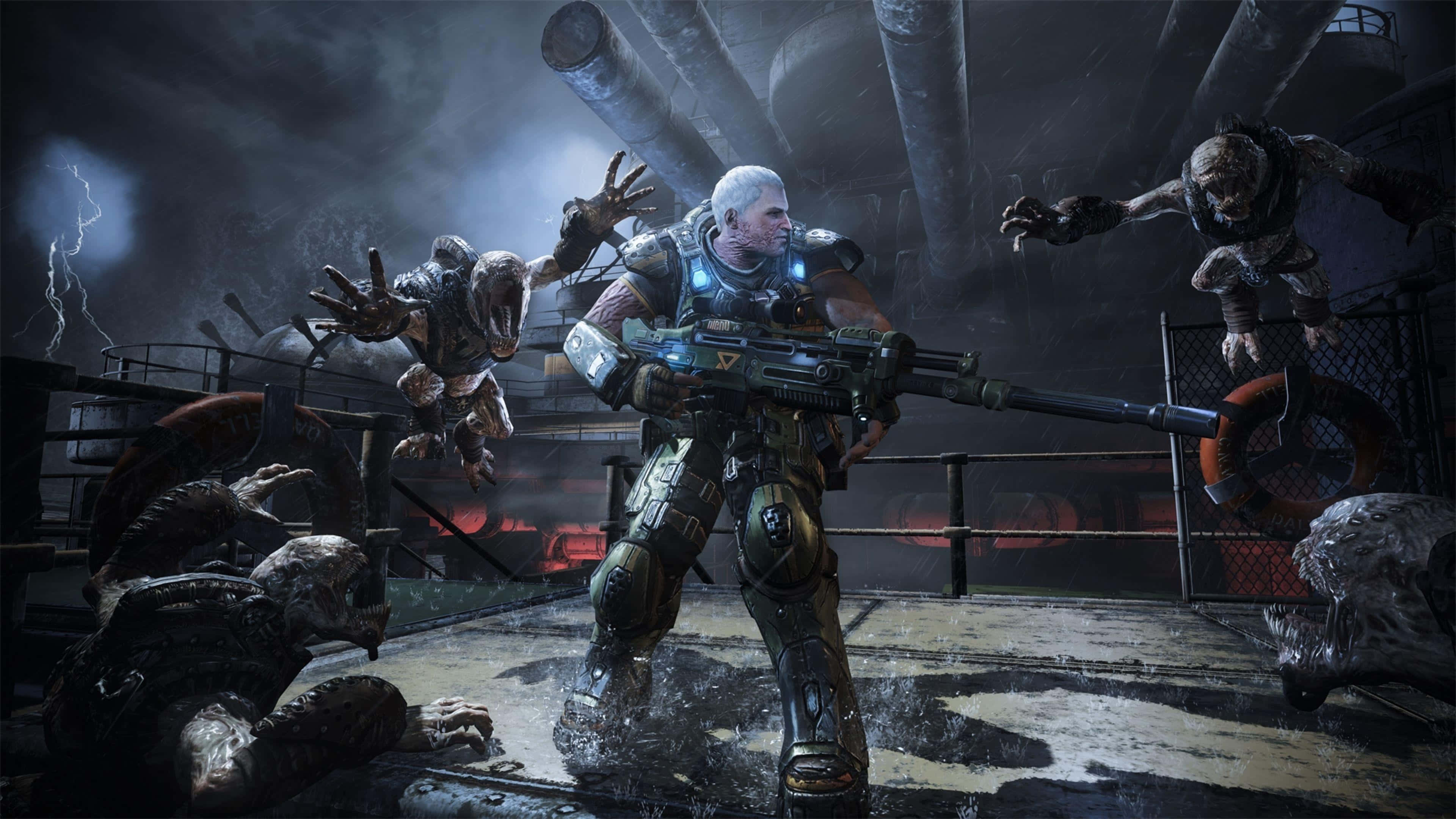 Gears Of War 5 桌布 壁紙 — 一名身穿重型盔甲的士兵在暴風雨的工業環境中向怪誕的殭屍般生物開火。