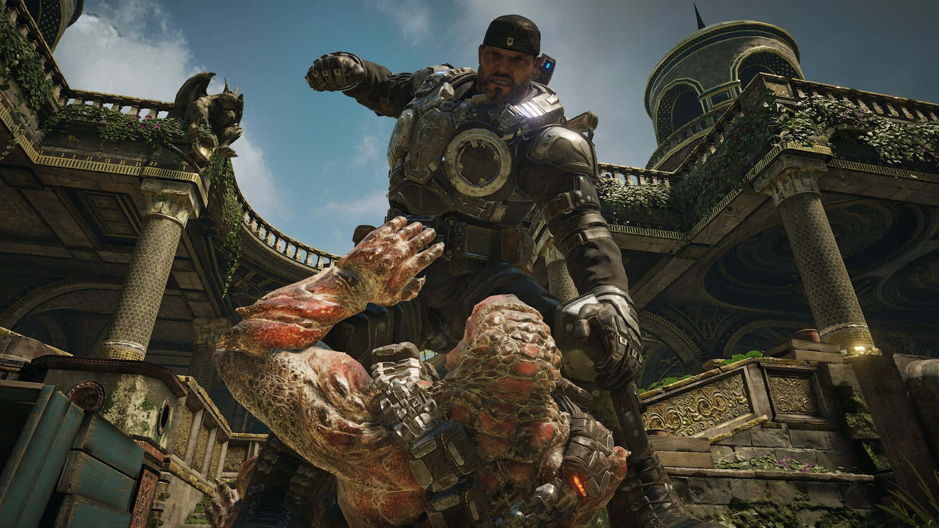 Best Gears Of War 5 桌布 壁紙 — 一名身穿重甲的士兵勝利地站在一個怪誕、腐爛的怪物之上，背景是破敗、藤蔓纏繞的哥德式庭院。