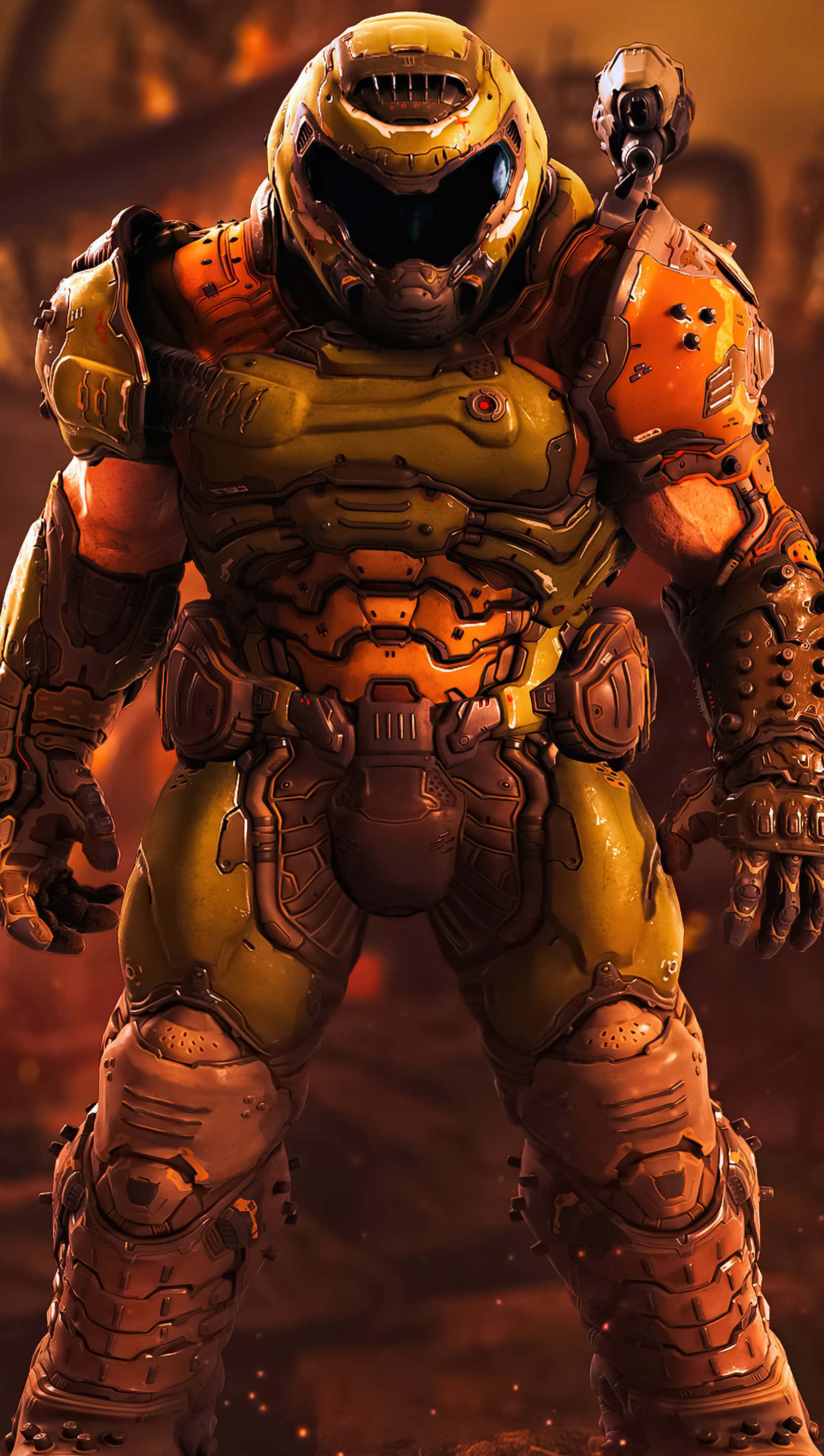 Doom Slayer 桌布 壁紙 — 一名身穿金色和橙色重型裝甲的太空陸戰隊員，在熾熱的橙色背景下威嚴地站立。