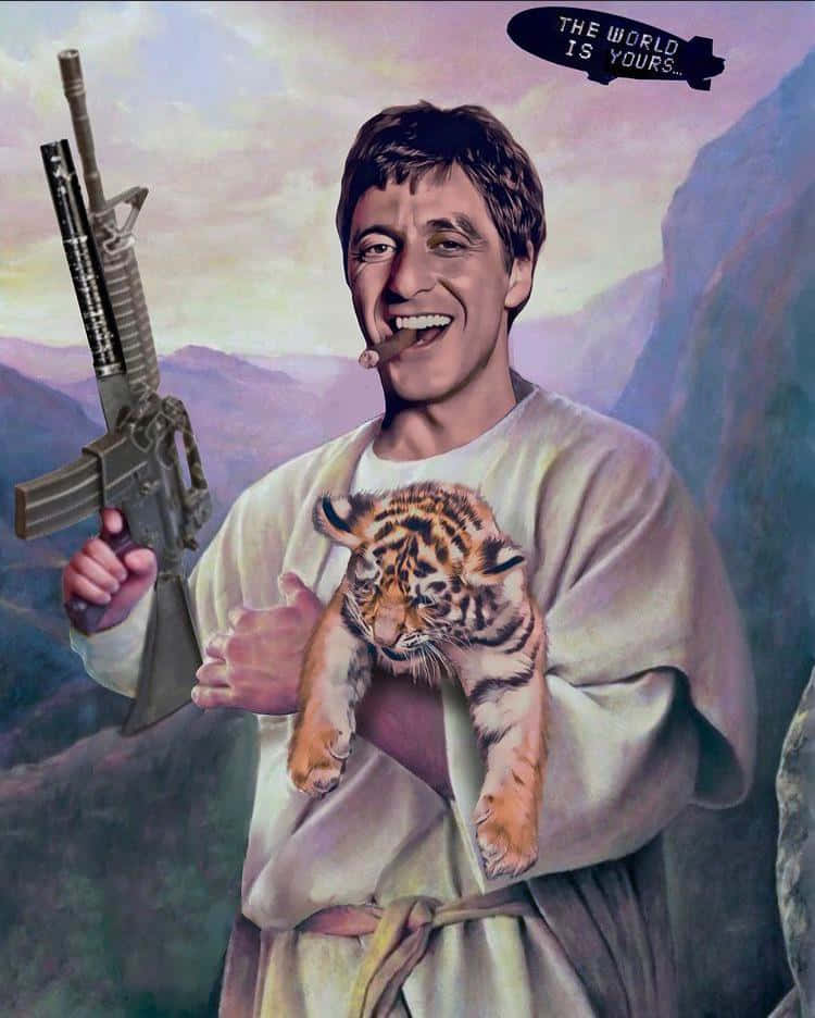 桌布 壁紙 — 一名身穿長袍的男子，在山的背景下抱著一隻小老虎和一支突擊步槍，飛艇上寫著「世界是你的」。