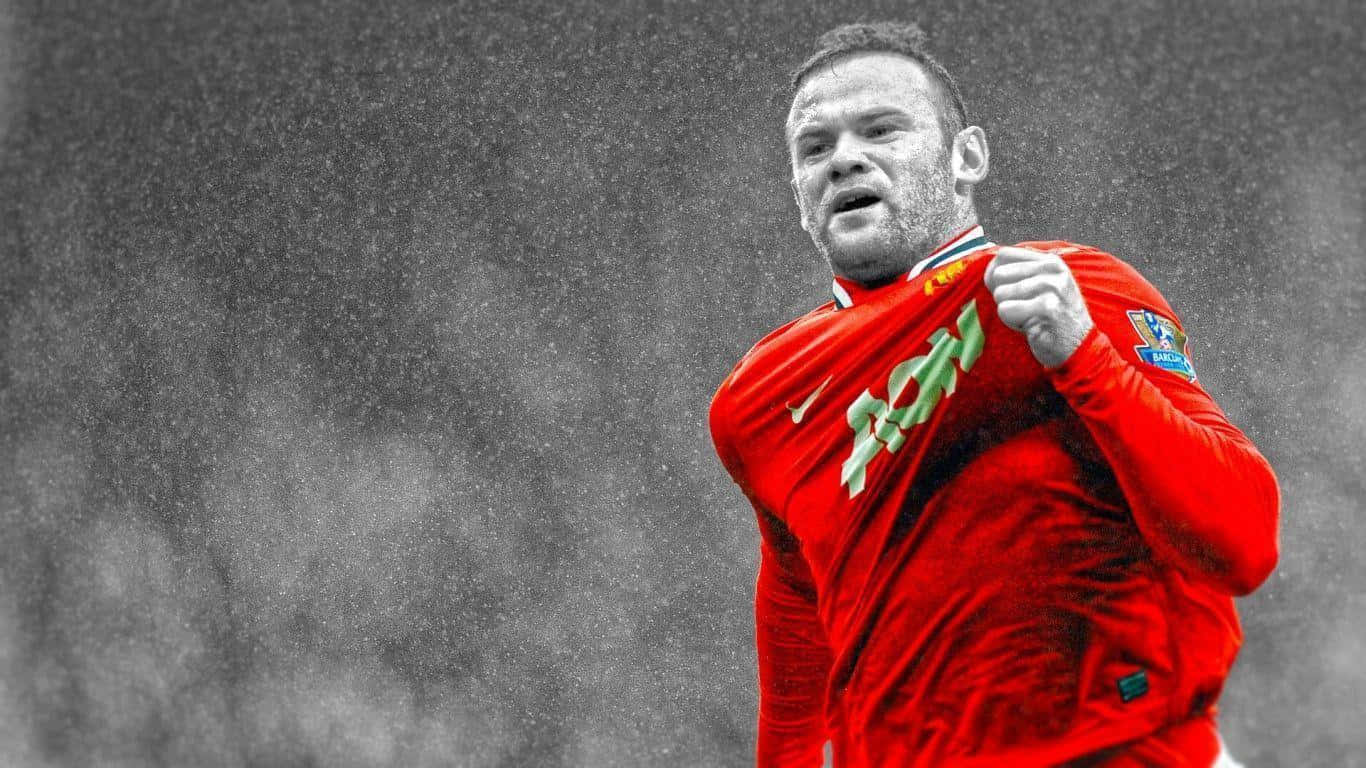 Wayne Rooney 桌布 壁紙 — 一名身穿鮮紅色球衣的足球運動員在單色暴雨背景下熱情慶祝。