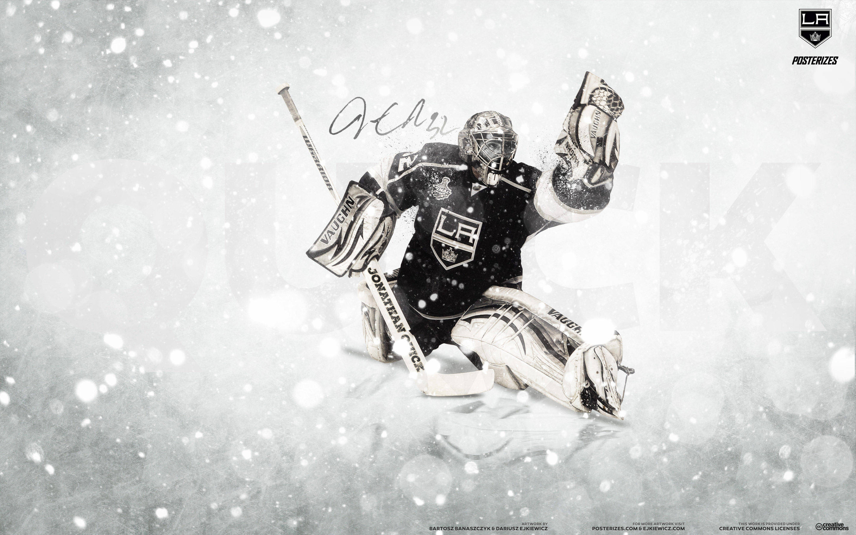 Los Angeles Kings 桌布 壁紙 — 一名身穿黑白裝備的冰球守門員在雪中蹲下，舉起球棍和手套。