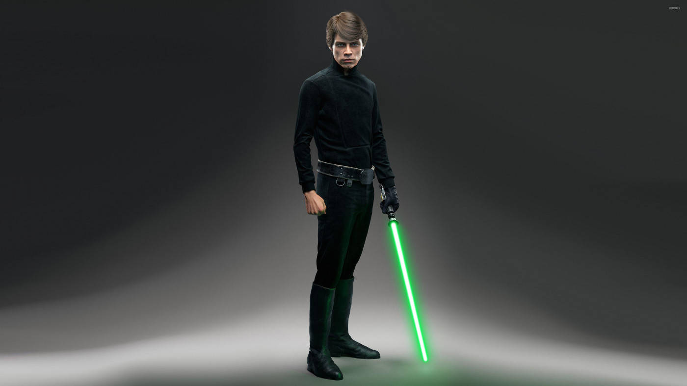 Star Wars Jedi 桌布 壁紙 — 一名身穿黑色絕地服裝的年輕男子在深色漸變工作室背景前手持發光的綠色光劍。