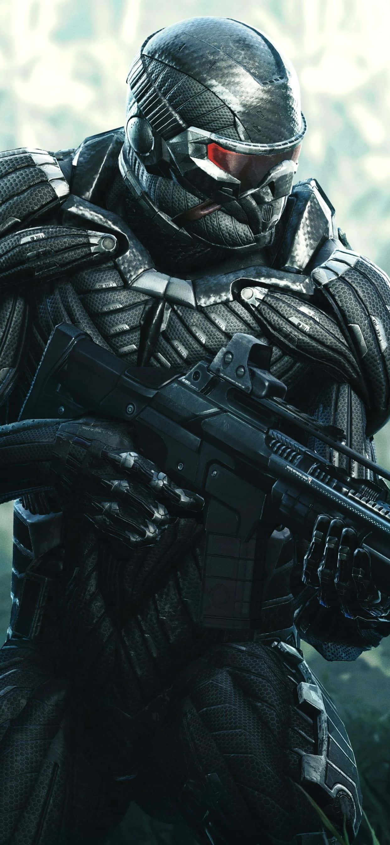 iPhone Xs Max Crysis Warhead 桌布 壁紙 — 一名身穿黑色裝甲裝備、配備紅色發光護目鏡的未來戰士，以緊張的戰鬥姿態手持步槍。