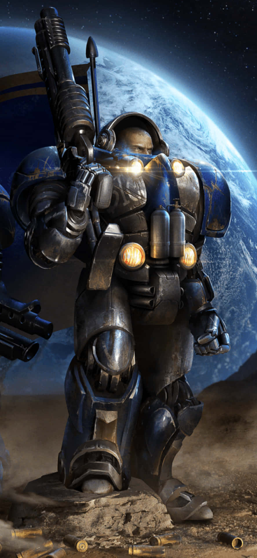 電玩遊戲 桌布 壁紙 — 一名重裝士兵站在岩石外星行星上，手持巨大武器，背後有一顆發光的行星。
