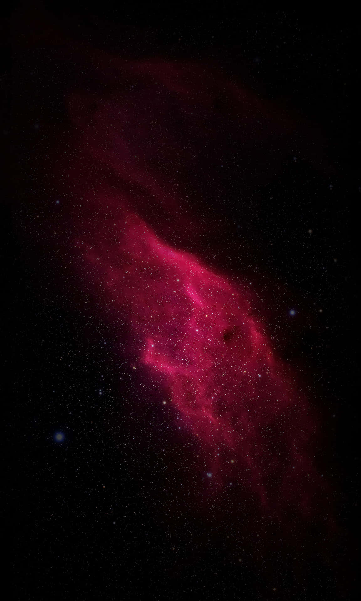 Best Oled 桌布 壁紙 — 一團充滿活力的深紅色星雲在點綴著遙遠星體的黑暗宇宙中旋轉。