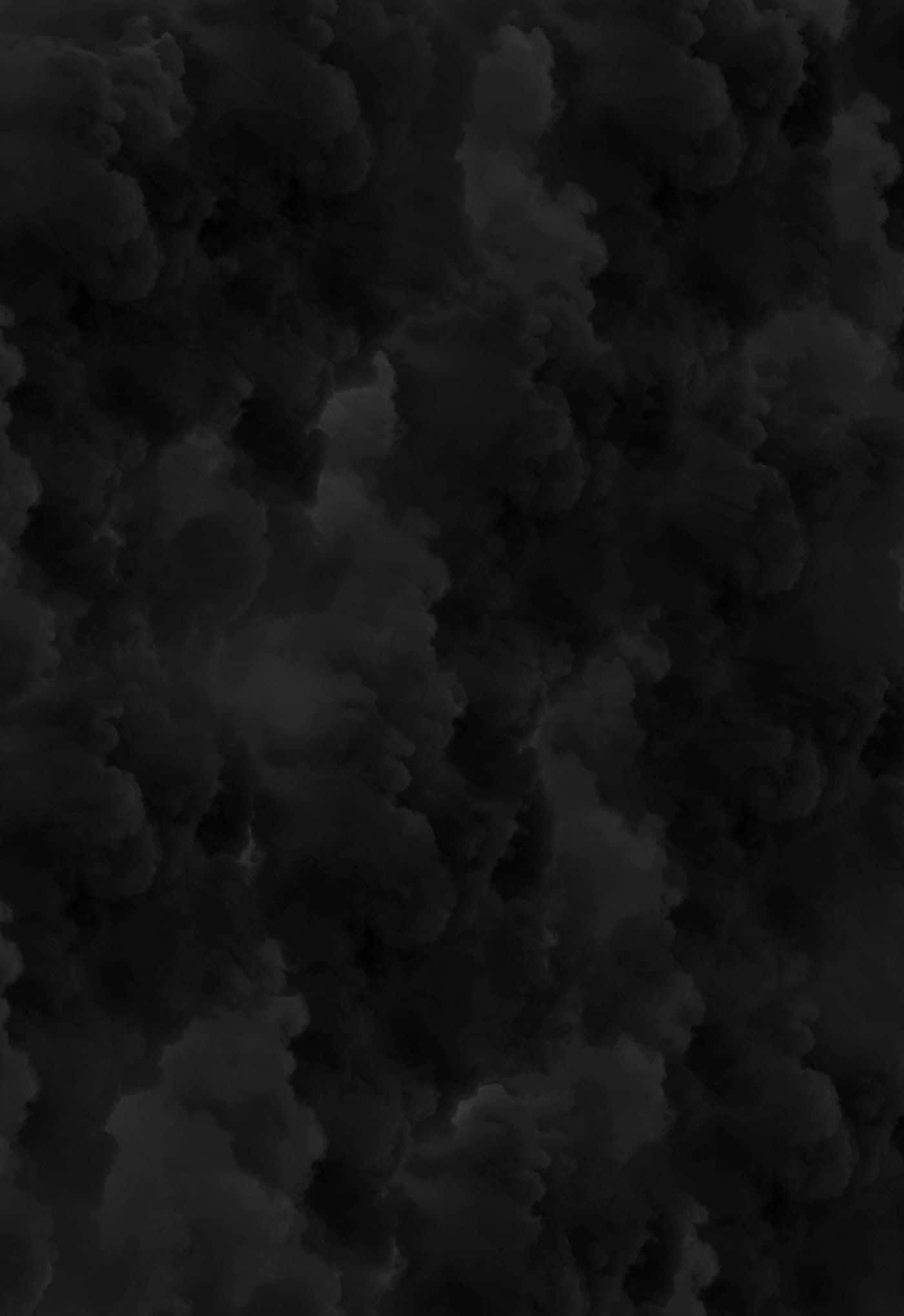 Black Clouds 桌布 壁紙 — 一團濃密旋轉的深色木炭煙霧充滿了畫面，帶有柔和的漸層和有機紋理。