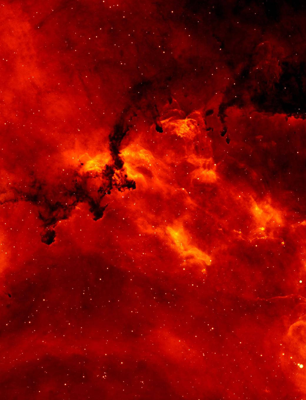 火焰動畫 桌布 壁紙 — 一團火紅色的星雲在星空中旋轉，伴隨著發光的橙色雲層和黑暗的宇宙塵埃。