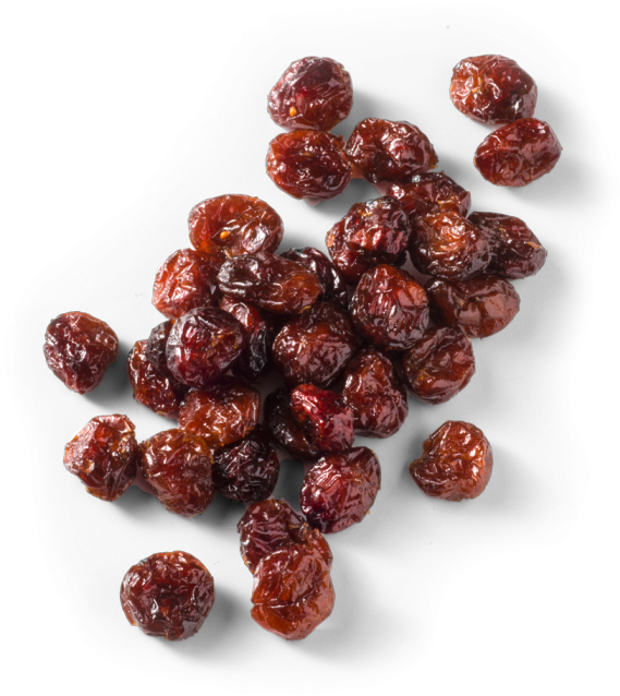 Healthy Food 桌布 壁紙 — 一堆飽滿的深紅色乾蔓越莓散落在純黑背景上。