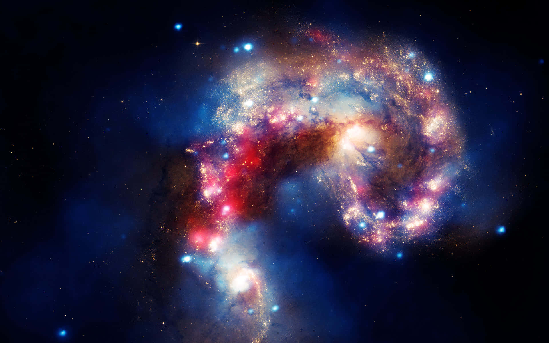 星雲 桌布 壁紙 — 一場充滿活力的宇宙星系碰撞，在繁星點點的虛空中旋轉著火紅、金色和深藍色。