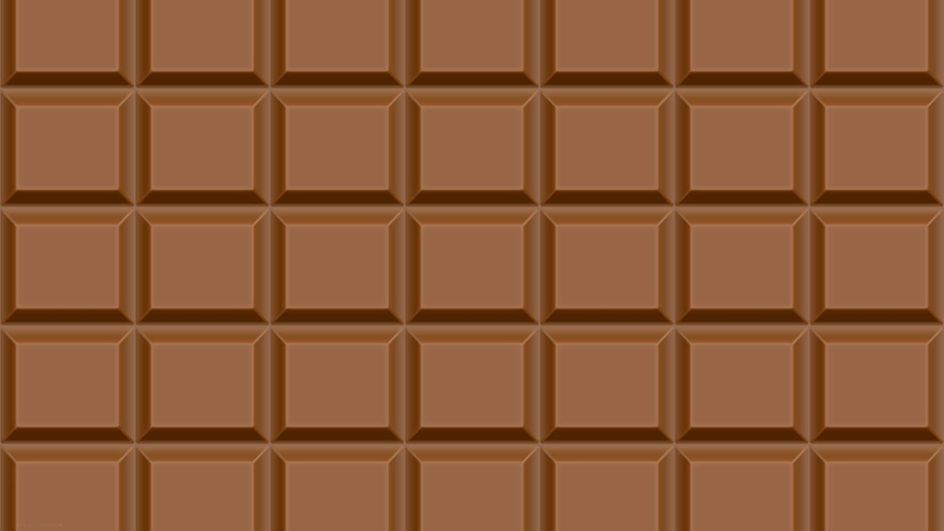 Brown Chocolate 桌布 壁紙 — 一塊光滑棕色巧克力條的特寫，帶有均勻劃分的方形格塊。