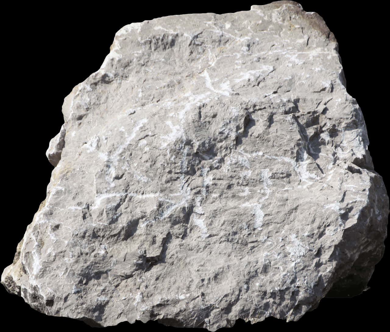 The Rock 桌布 壁紙 — 一塊帶有白色礦物脈的粗糙灰色岩石，孤立地矗立在純黑色背景前。
