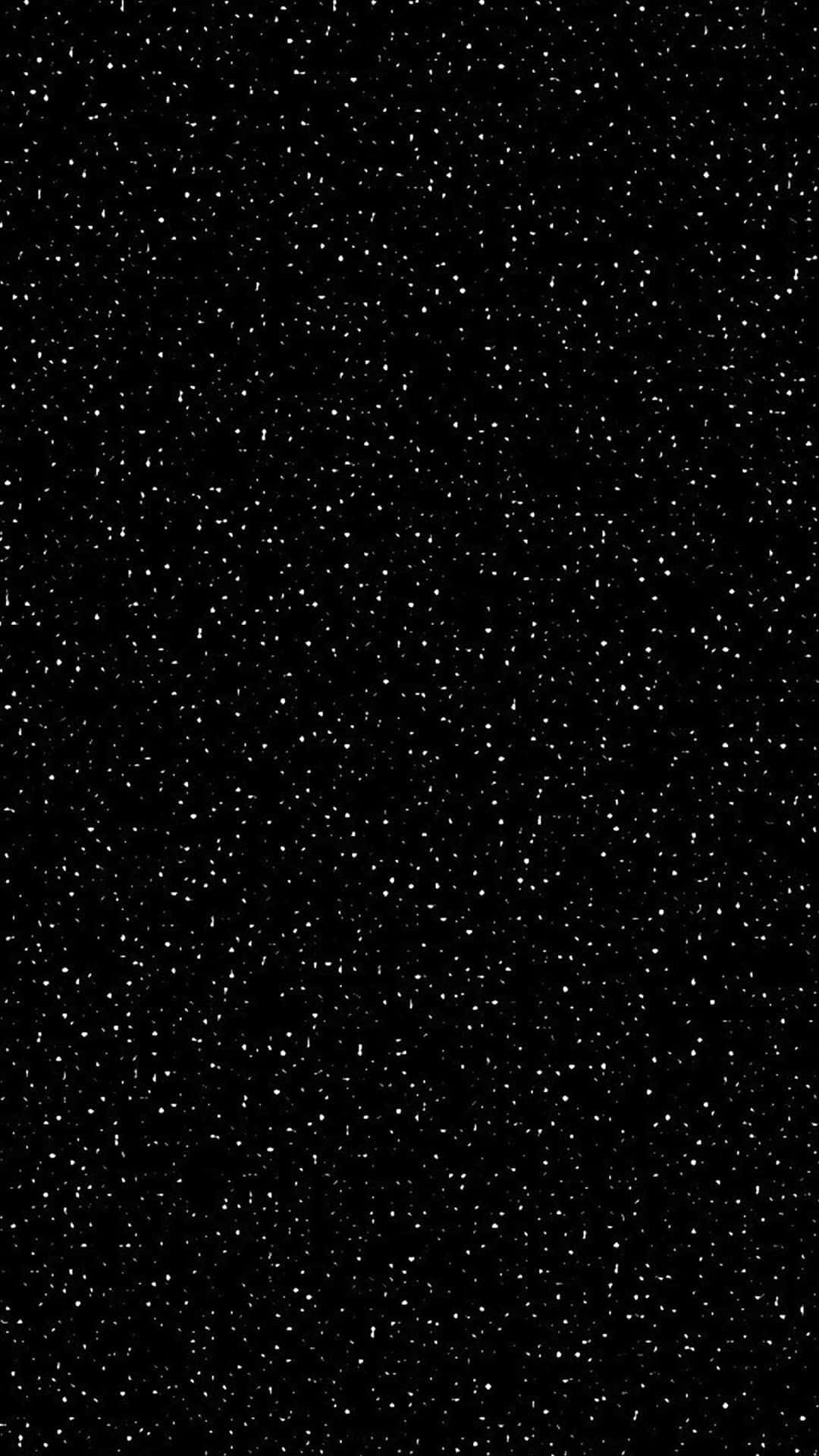 Stars 桌布 壁紙 — 一塊廣闊的黑色畫布上，點綴著無數細小的白色斑點，宛如深空中的遙遠星辰。