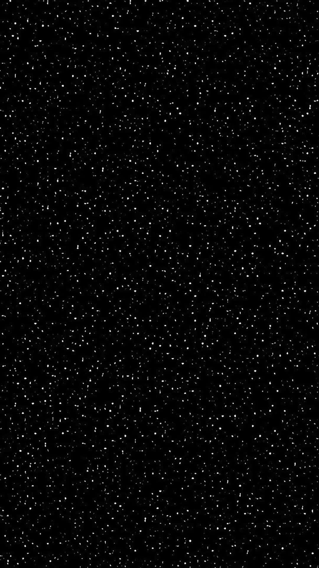 Aesthetic Night Sky 桌布 壁紙 — 一塊廣闊的黑色畫布上，點綴著無數細小的白色斑點，宛如深空中的遙遠星辰。