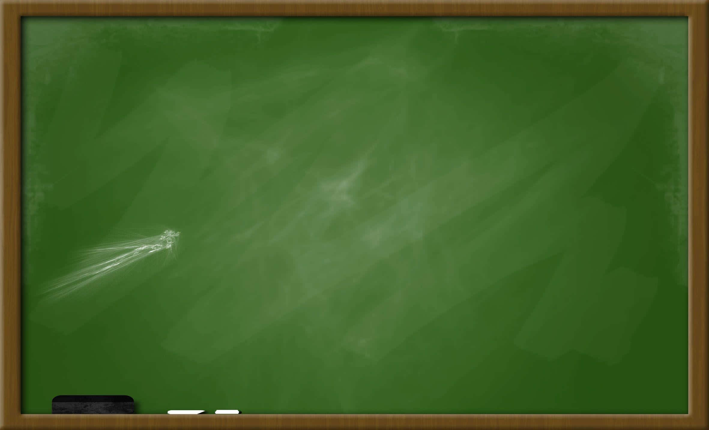 Blackboard 桌布 壁紙 — 一塊復古綠色黑板，表面有淡淡的粉筆污跡和一條白色粉筆痕跡。