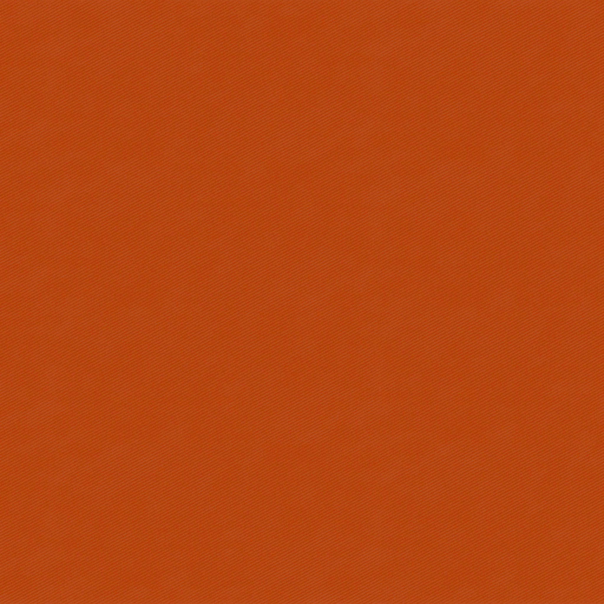 Dark Orange 桌布 壁紙 — 一塊純色赤陶橙色布料，帶有微妙的斜紋編織質感，覆蓋整個畫面。