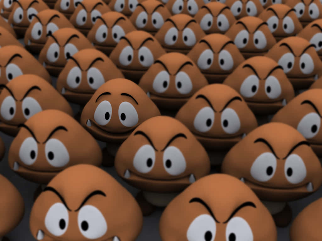 Goomba 桌布 壁紙 — 一大片密密麻麻、一模一樣的棕色Goomba角色，帶著憤怒的表情和白色的眼睛，專注地向前凝視。