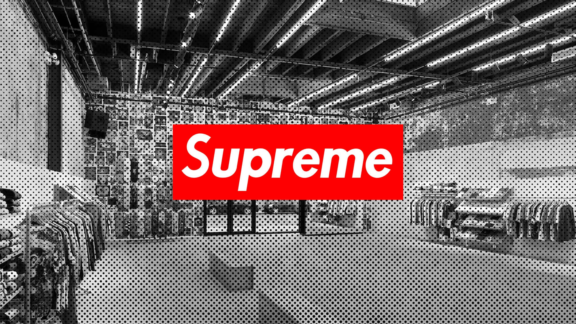 一家商店的黑白照片，上面有Supreme字樣 壁紙