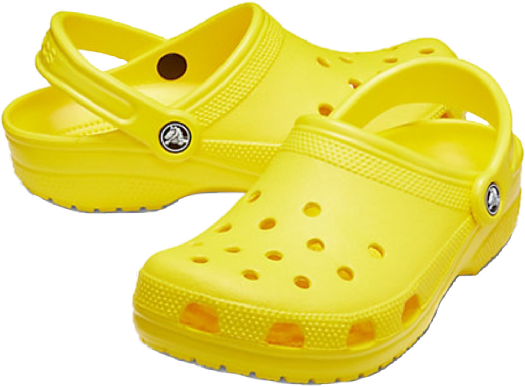 Crocs 桌布 壁紙 — 一對亮黃色木屐，帶有經典穿孔和品牌標誌，置於純白背景上。