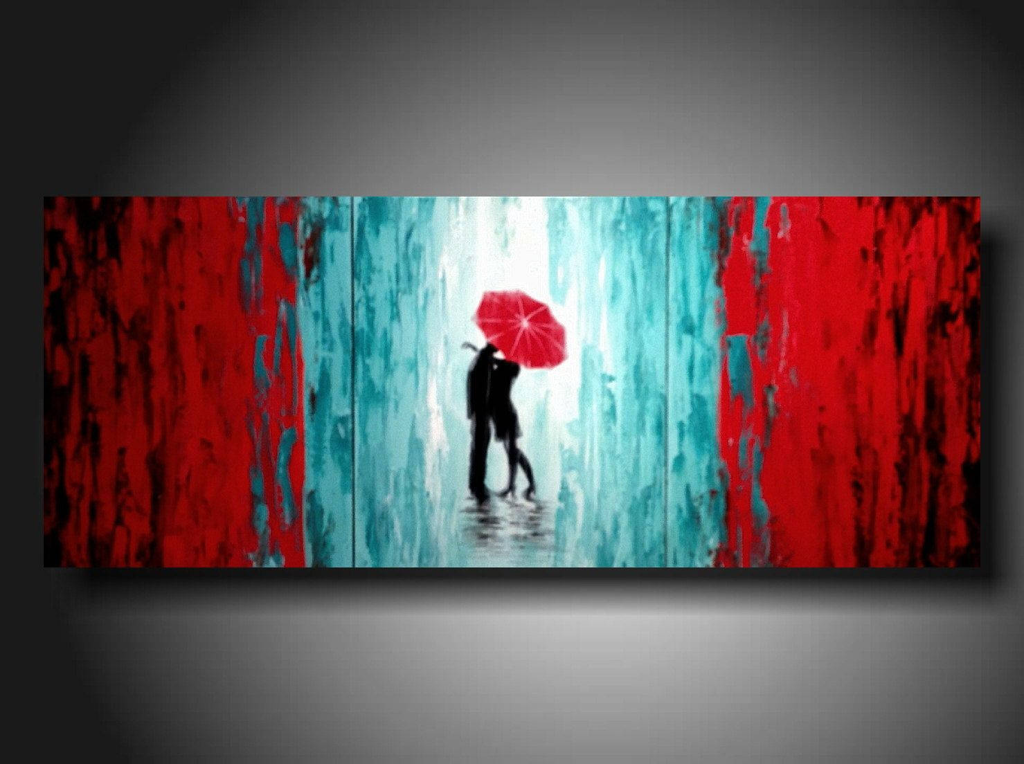 藝術 桌布 壁紙 — 一對剪影情侶在雨天下共用一把鮮紅色雨傘，周圍環繞著大膽的紅色和藍綠色抽象筆觸。