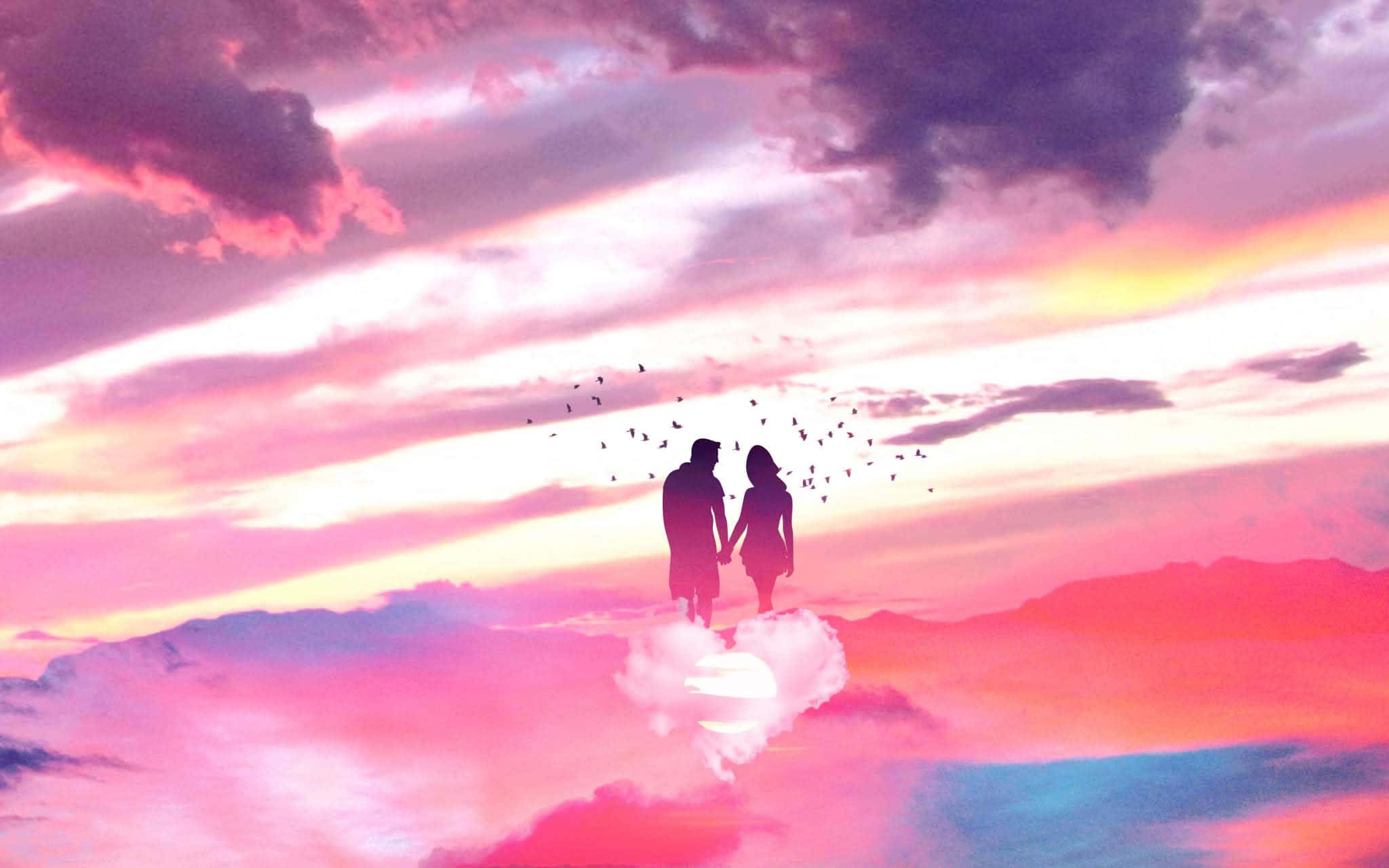 lover 桌布 壁紙 — 一對情侶在充滿活力的粉紅色和紫色日落天空下，於心形雲朵上牽手，鳥兒在他們周圍飛翔。