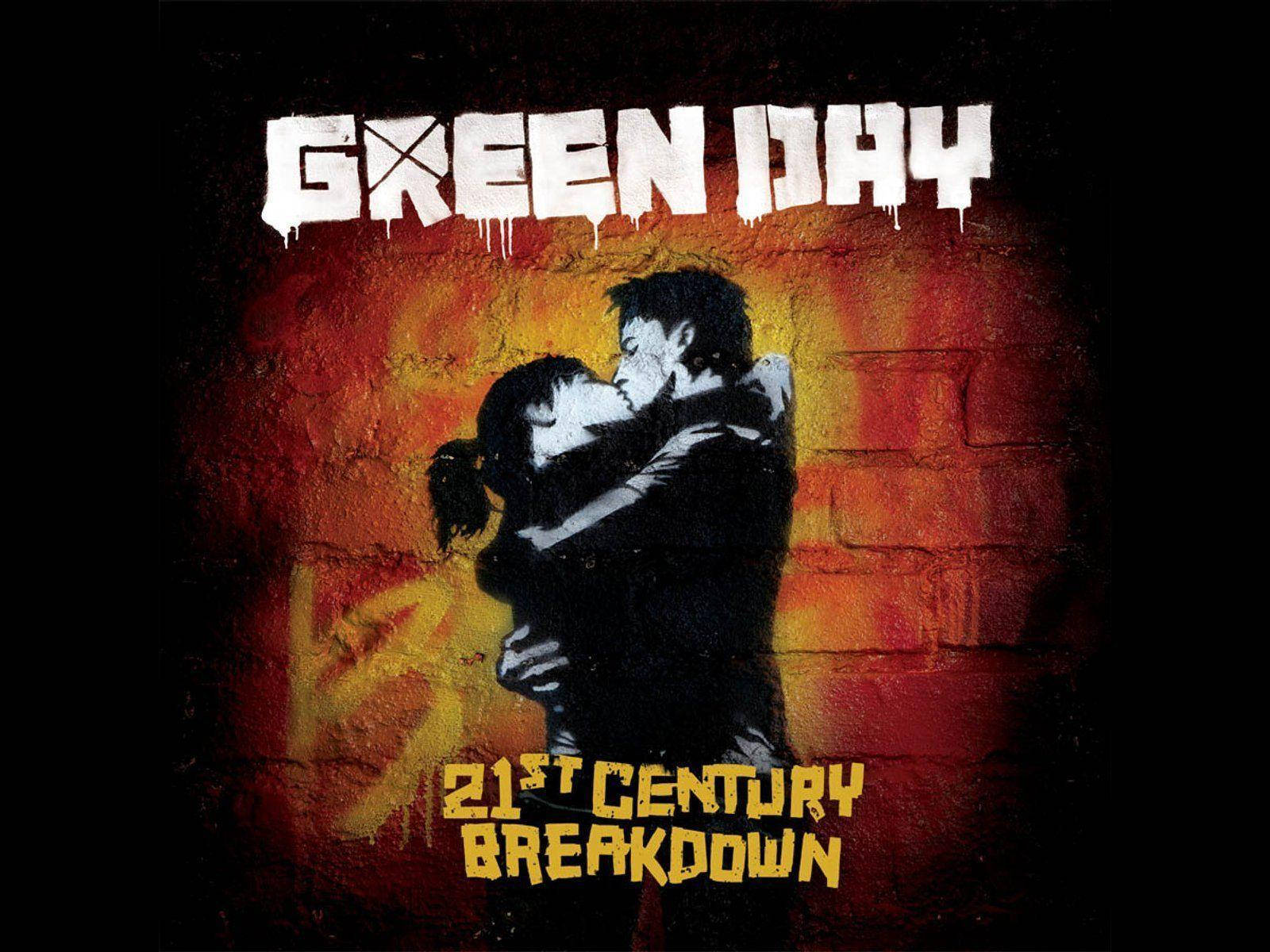 Green Day 桌布 壁紙 — 一對情侶在火焰磚牆前擁抱的風格化黑色剪影，帶有滴落的白色和黃色文字。
