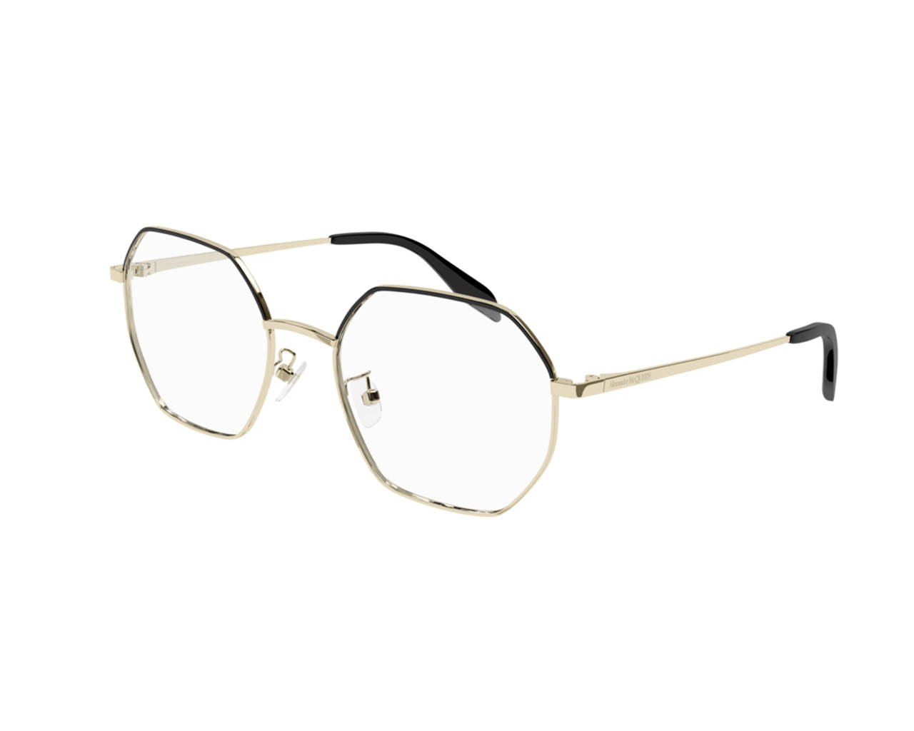 Sunglasses 桌布 壁紙 — 一對時尚的金色和黑色六邊形框眼鏡，配透明鏡片，置於純白色背景上。