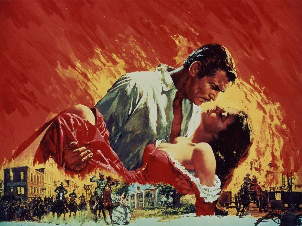 Romance 桌布 壁紙 — 一對熱戀中的情侶在火紅的天空下擁抱，下方騎兵隊衝入燃燒的小鎮。