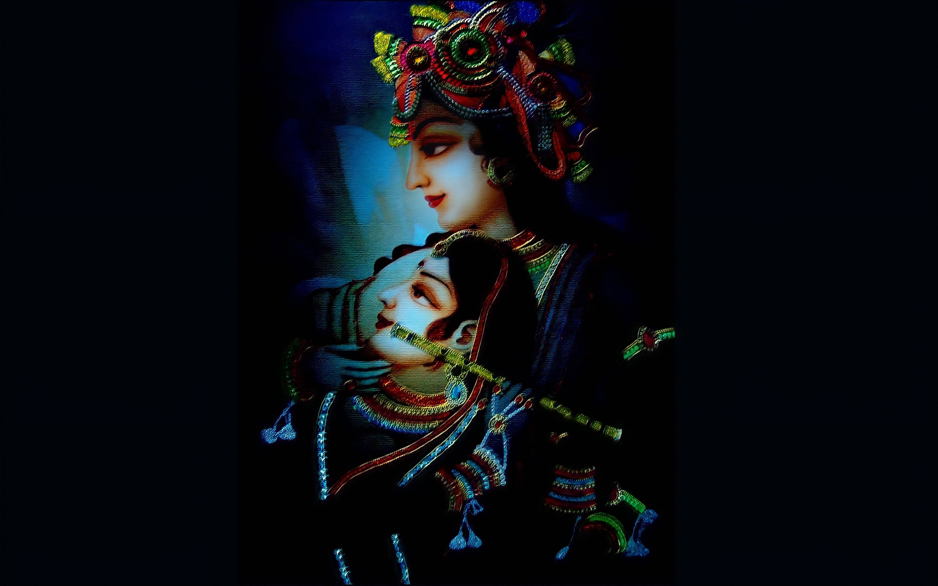 radha krishna 3d 桌布 壁紙 — 一對神聖情侶穿著華麗的傳統服飾，在黑暗背景下擁抱，帶有發光的藍色和金色點綴。