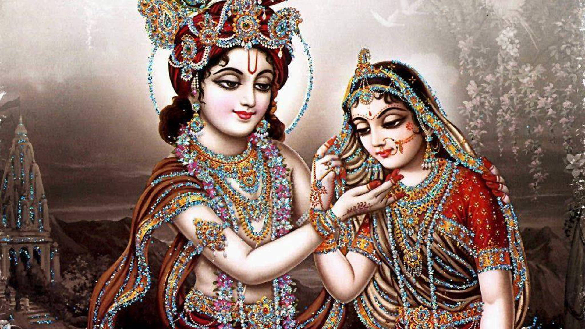 Krishna Desktop 桌布 壁紙 — 一對神聖的夫婦身著精緻的珠寶服飾，在寺廟背景下分享溫柔時刻。