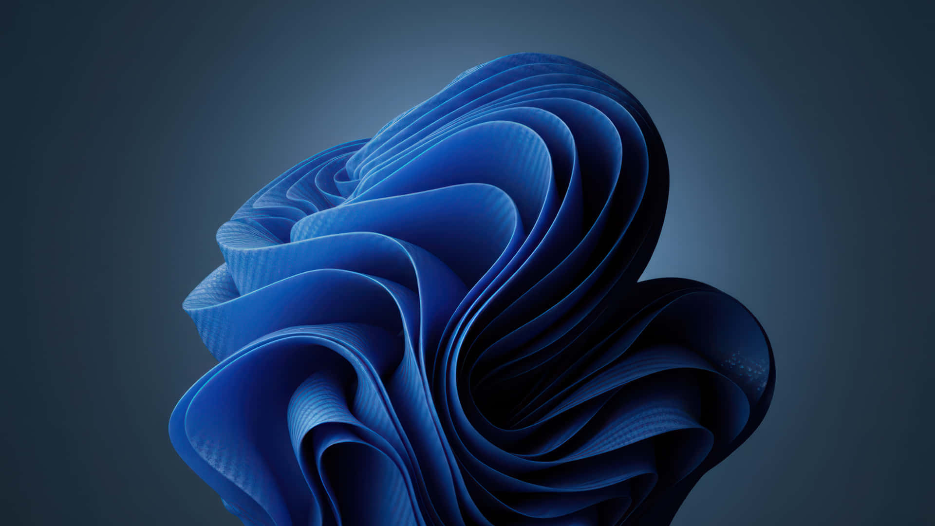Blue Carbon fider Bloom modded wallpaper for desktop Enhancement, 壁紙 — 一層層藍色布料形成的旋轉抽象雕塑，在深色漸變背景上營造出動態流體運動。