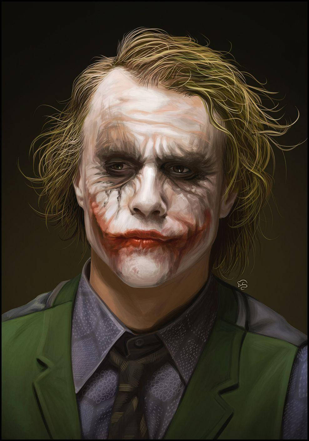 Heath Ledger 桌布 壁紙 — 一幅令人毛骨悚然的小丑肖像，臉上塗抹著白色顏料和紅色嘴唇，背景陰暗。