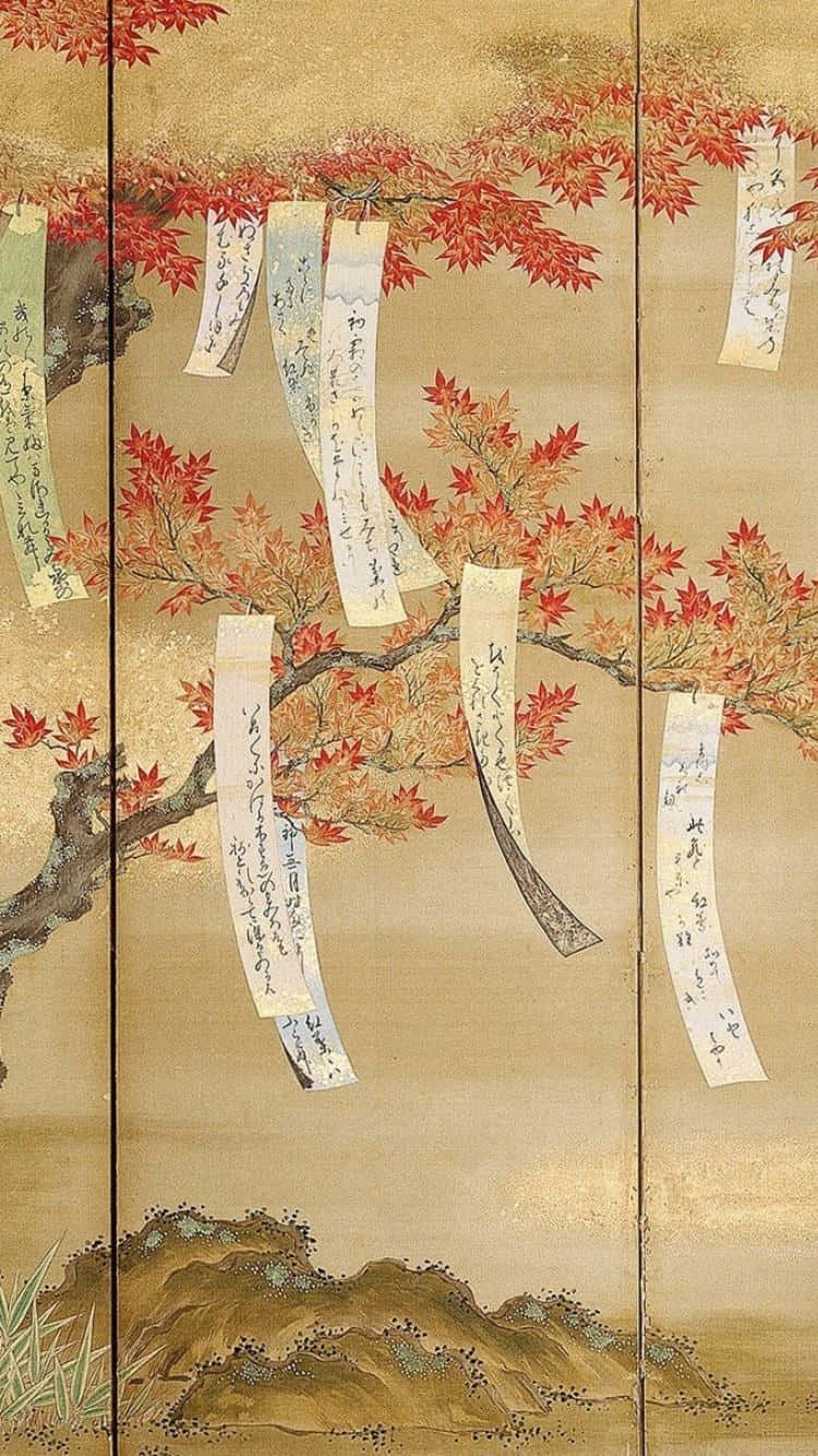 桌布 壁紙 — 一幅傳統日本屏風描繪了一棵楓樹，樹上長滿鮮紅色的葉子，並掛著手寫的紙條，背景為金色。