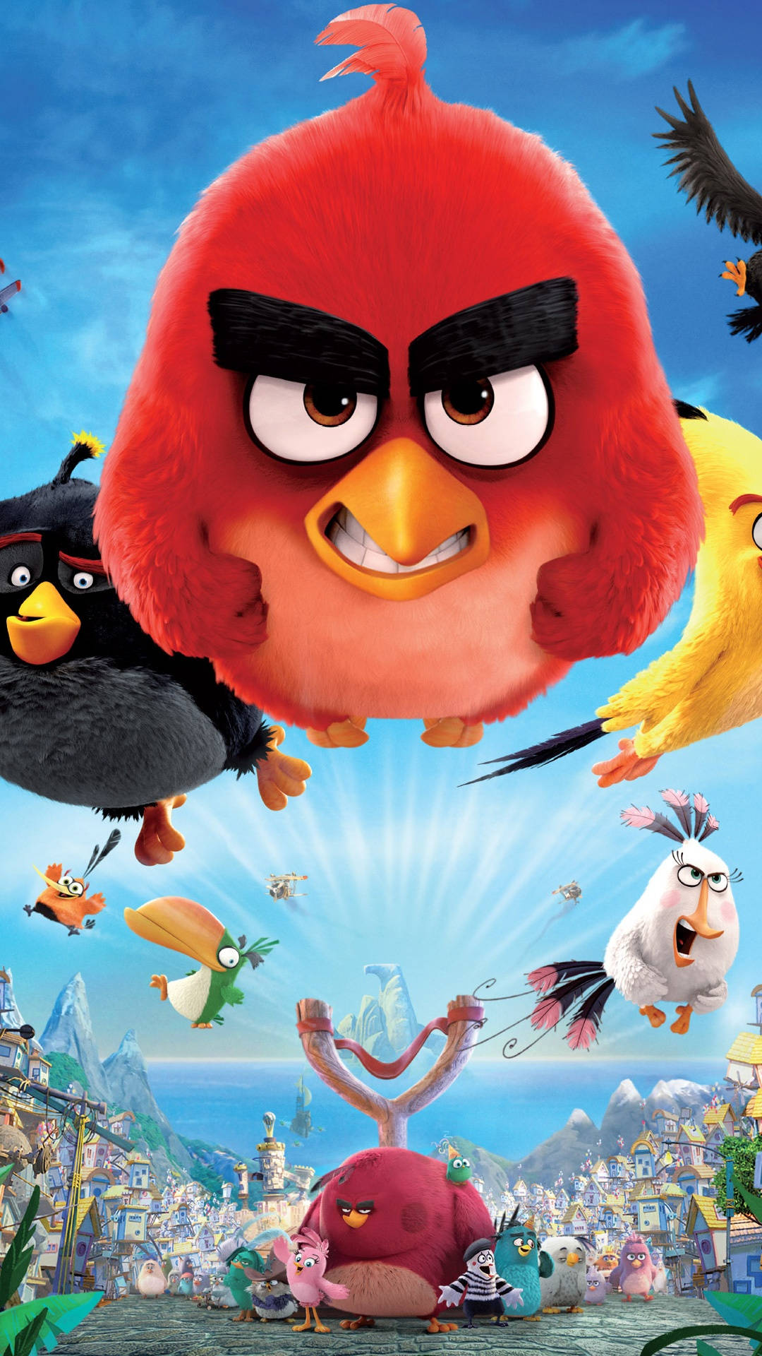 Animated Cartoon 桌布 壁紙 — 一幅充滿活力的3D渲染海報，憤怒鳥角色在色彩繽紛的島嶼村莊上空翱翔，旁邊有一個巨大的彈弓。