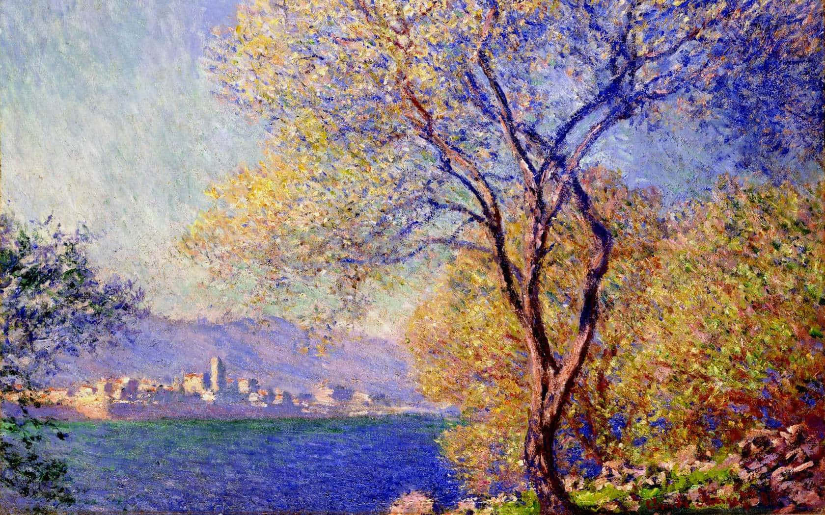 Impressionism 桌布 壁紙 — 一幅充滿活力的印象派畫作，描繪一棵金葉樹木，在柔和藍天下框住遠處的湖邊小鎮。