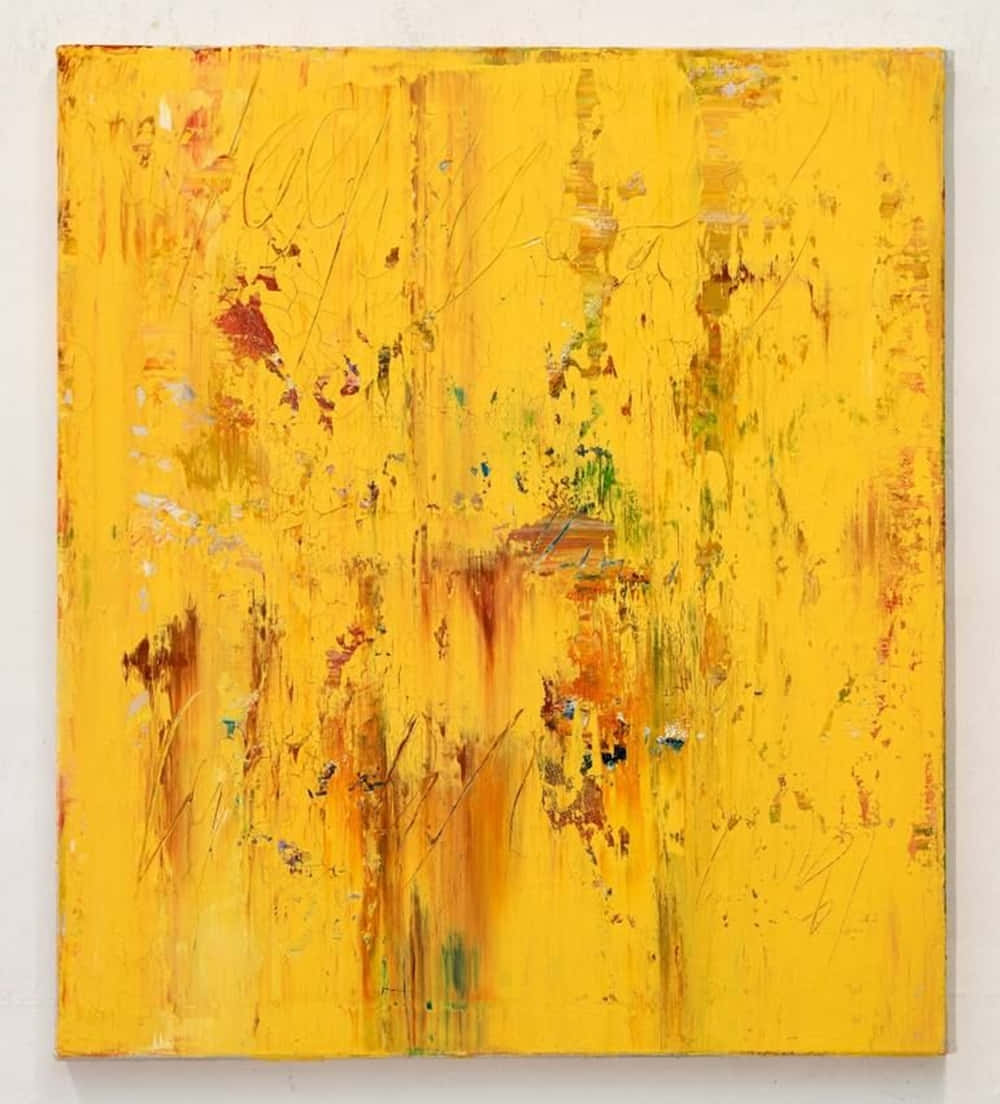 Yellow Art 桌布 壁紙 — 一幅充滿活力的抽象畫，以黃色為主，帶有橙褐色條紋，以及綠色和藍色的點綴，紋理筆觸。