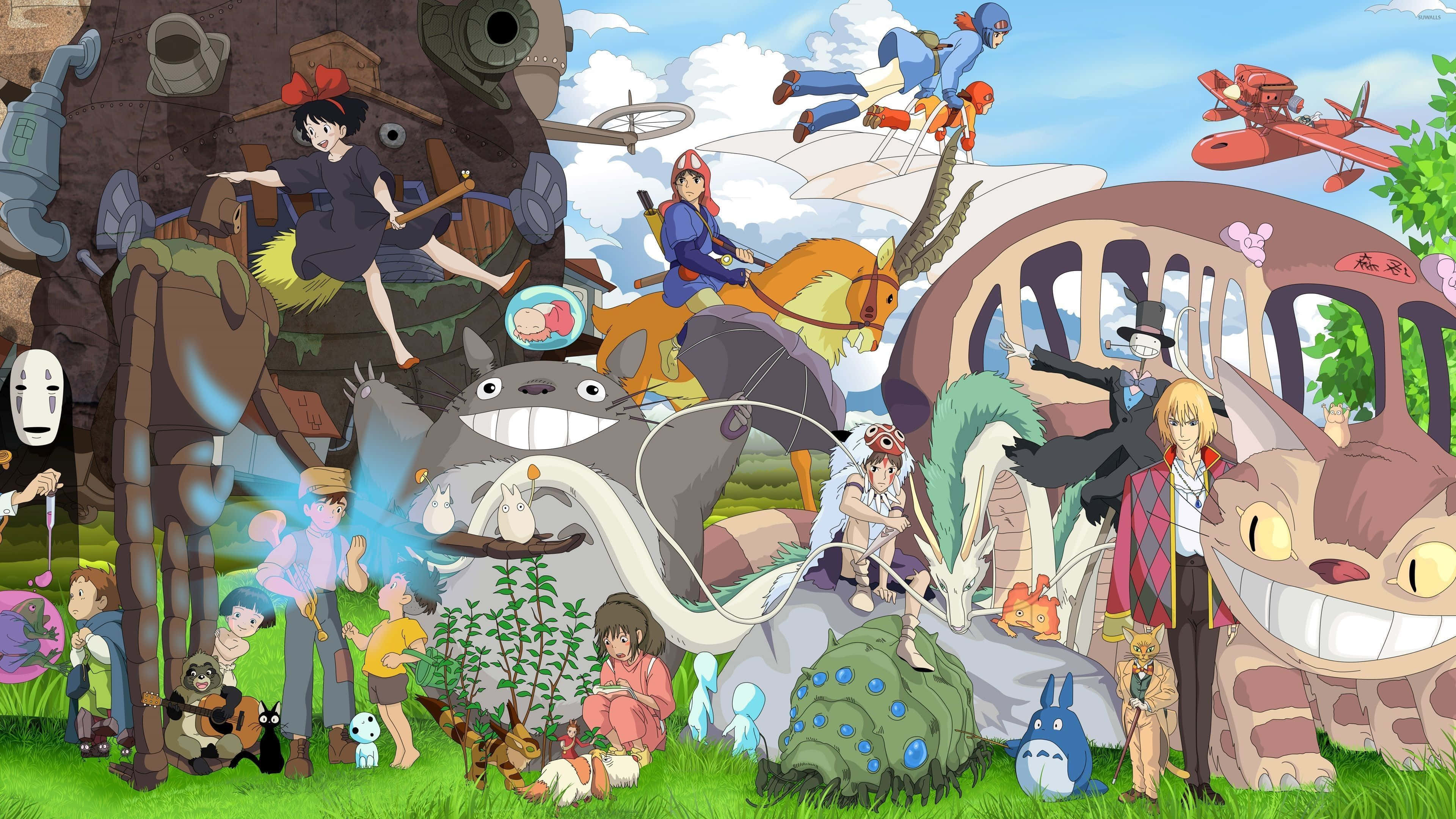 Aesthetic Ghibli 桌布 壁紙 — 一幅充滿活力的拼貼畫，描繪了包括龍貓和無臉男在內的吉卜力工作室角色，聚集在茂密的綠色草地上，頭頂是明亮的藍天。