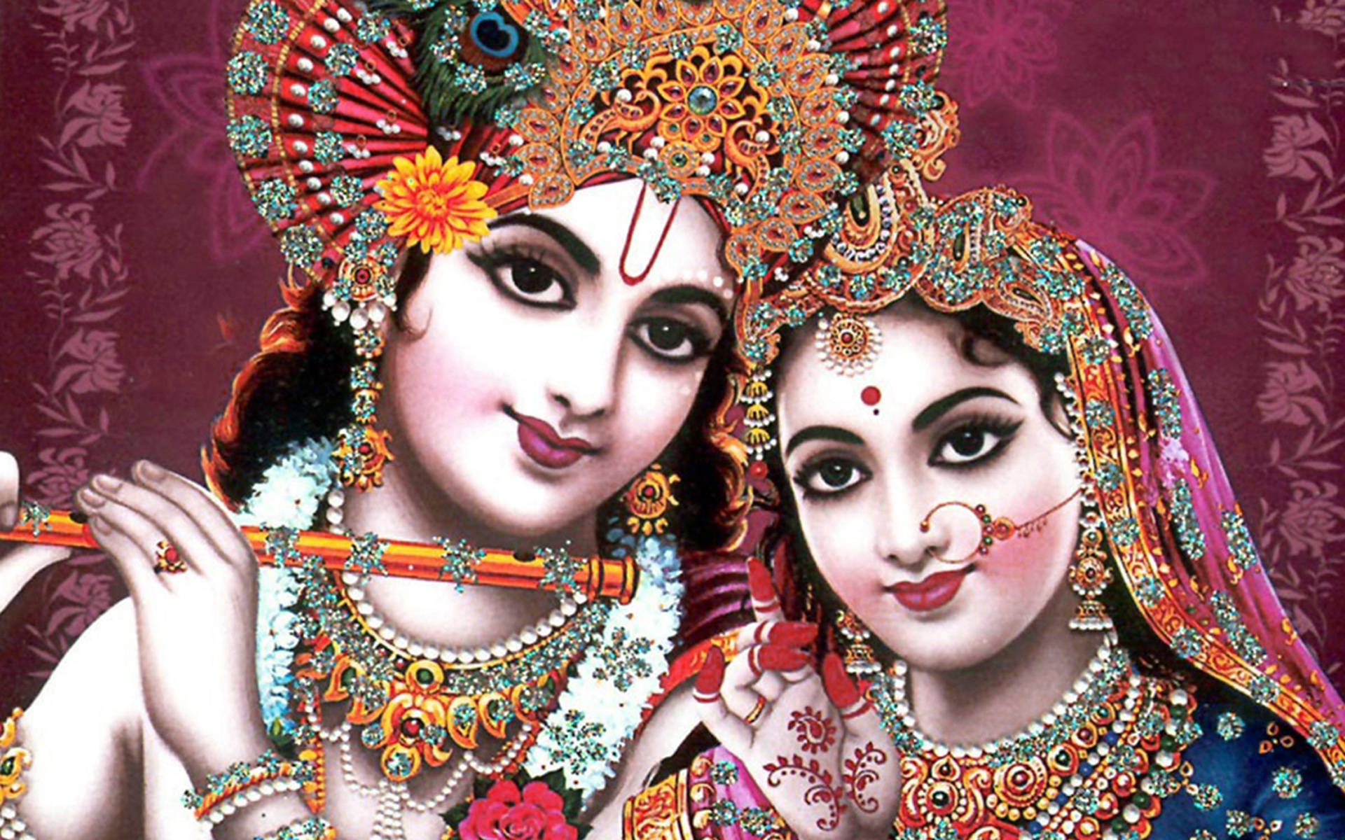 India 桌布 壁紙 — 一幅充滿活力的插圖，描繪了克里希納和拉達，他們身著華麗的珠寶和色彩繽紛的傳統服飾，背景是深酒紅色的花卉圖案。