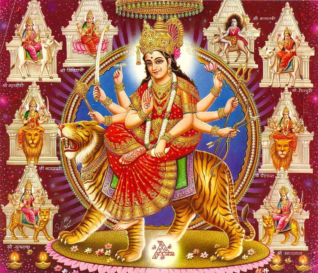 Mata Rani 桌布 壁紙 — 一幅充滿活力的插圖，描繪印度教女神杜爾迦騎著老虎，周圍是她九個形態的雕像，背景是星光點點的紫色。