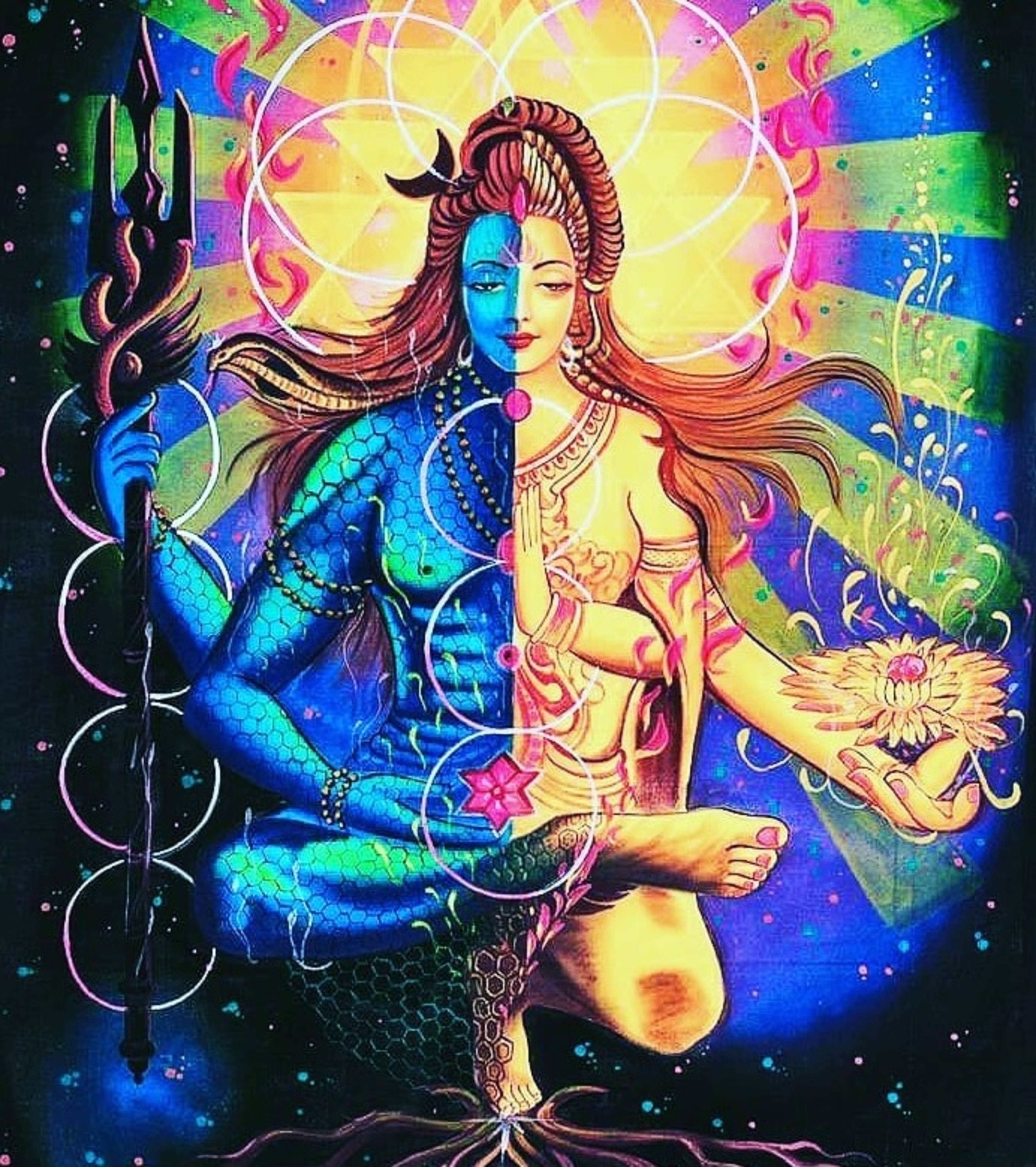 藍色 桌布 壁紙 — 一幅充滿活力的數位藝術描繪，一位神聖的女性形象分為藍色和金色兩半，在宇宙迷幻背景下手持三叉戟和蓮花。