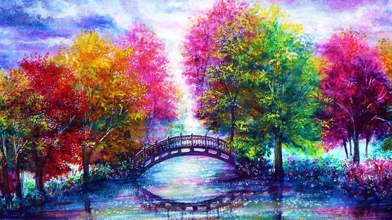森林 桌布 壁紙 — 一幅充滿活力的水彩畫，描繪一座木橋拱跨在倒映著周圍秋色樹木的溪流之上。