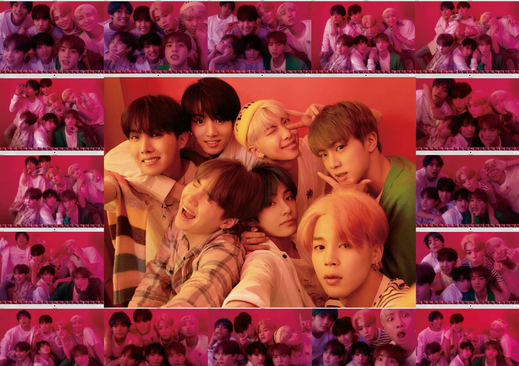 Big Hit Entertainment 桌布 壁紙 — 一幅充滿活力的粉紅色調拼貼畫，展示一個K-pop團體緊密地擺出俏皮表情。
