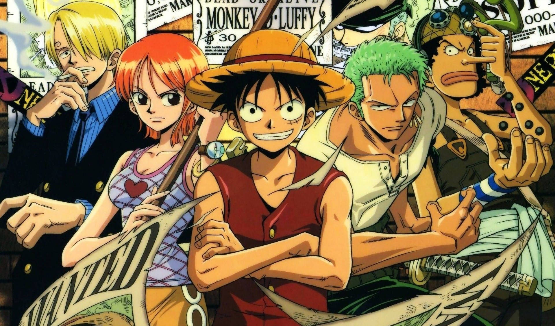 Luffy 桌布 壁紙 — 一幅充滿活力的草帽海賊團動畫群像，背景有懸賞海報。