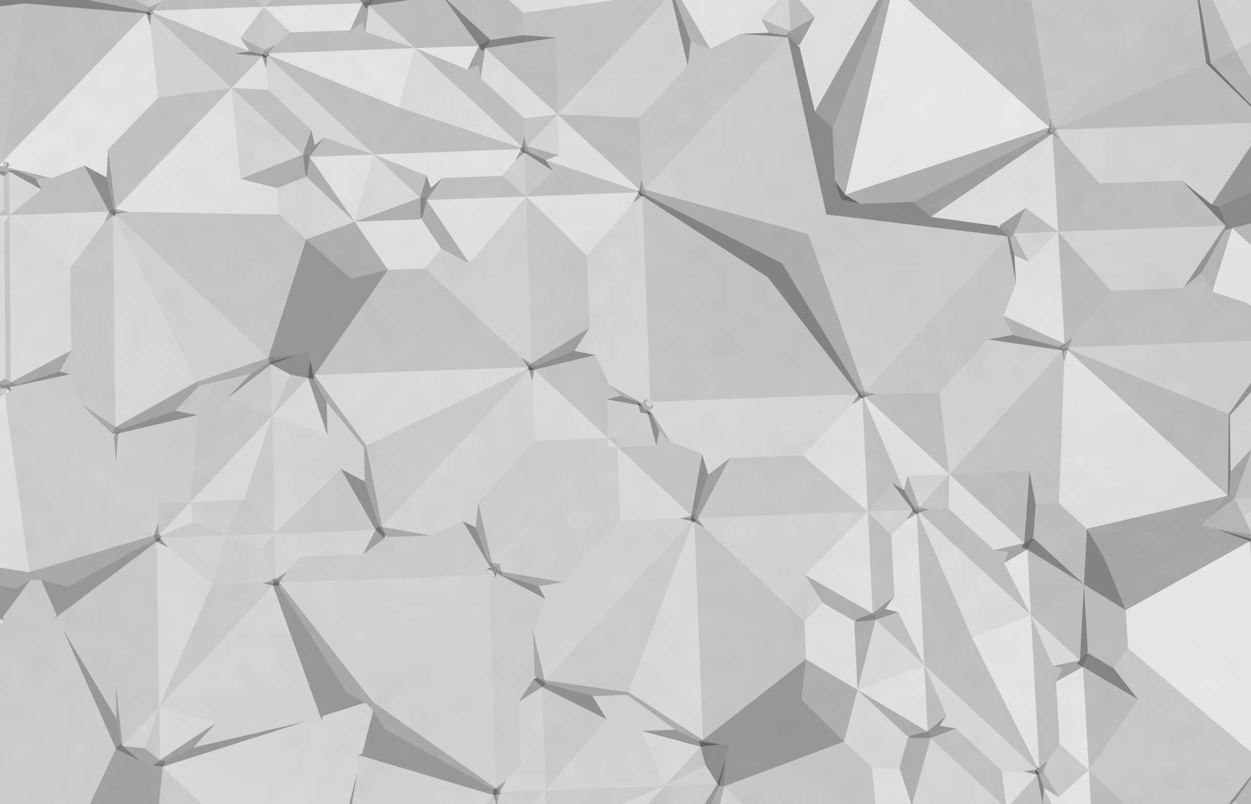 Geometric Desktop 桌布 壁紙 — 一幅單色抽象壁紙，呈現由不同灰色調的互鎖多邊形組成的碎片化幾何圖案。