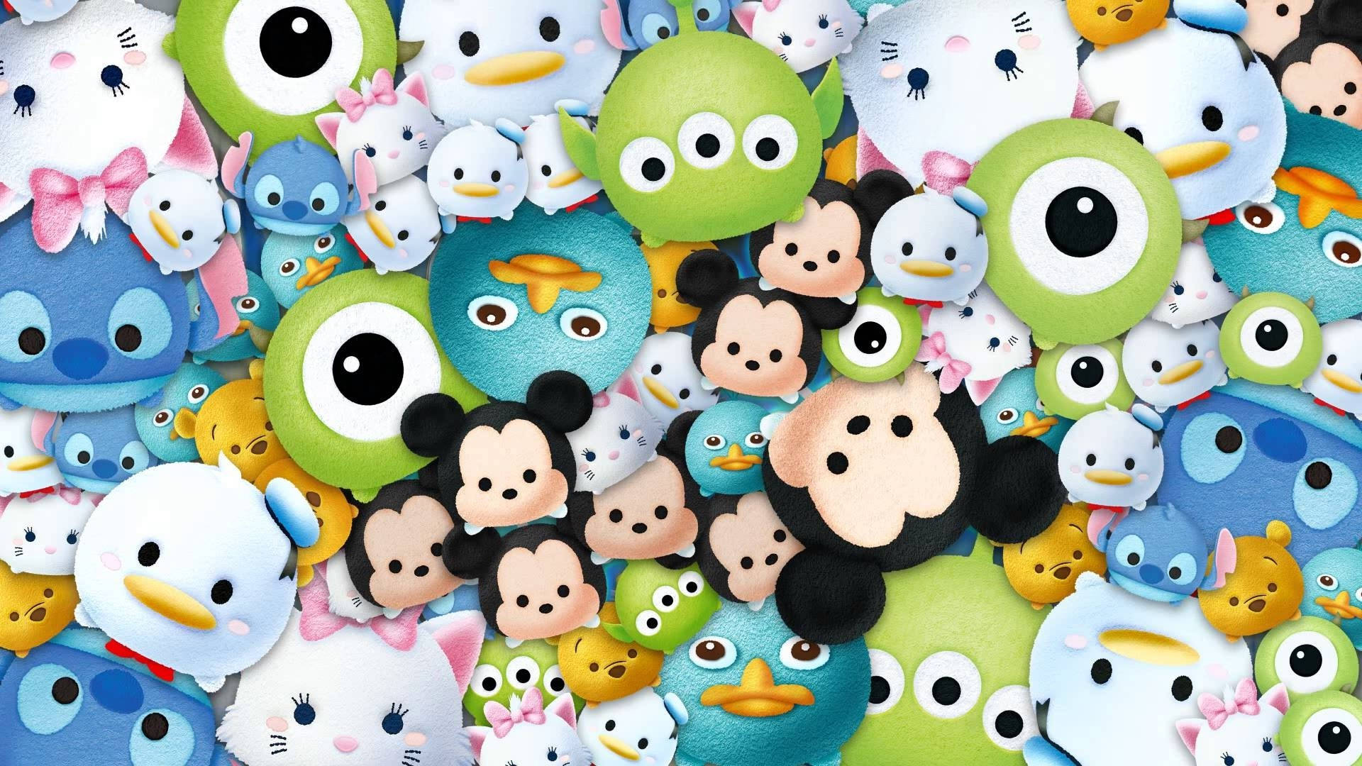 一個充滿活力的迪士尼 Tsum Tsum 絨毛玩偶角色收藏，以密集、俏皮的排列方式呈現。 — Tsum tsum 壁紙
