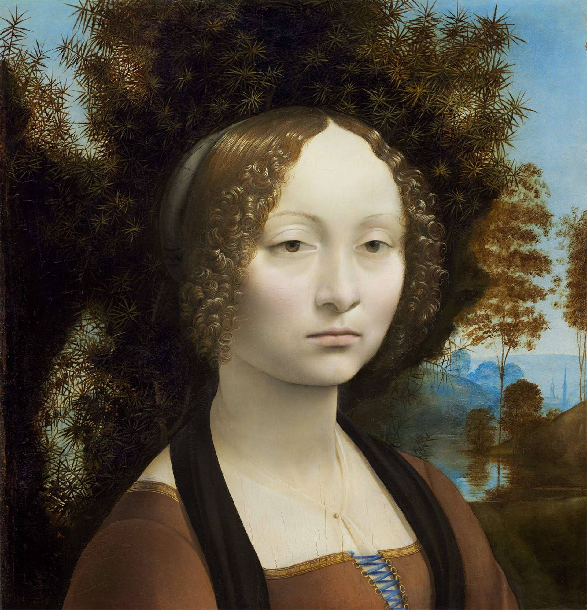 Leonardo Da Vinci 桌布 壁紙 — 一幅寧靜的文藝復興時期肖像畫，描繪一位捲髮女性，被深色樹葉環繞，背景是遙遠的風景。
