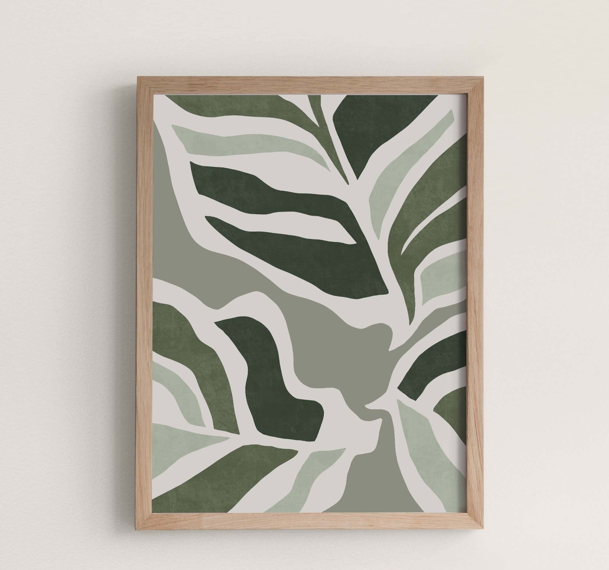 Minimalist Painting 桌布 壁紙 — 一幅帶有抽象綠色葉子圖案（深淺不一）的裱框極簡藝術品掛在素牆上。