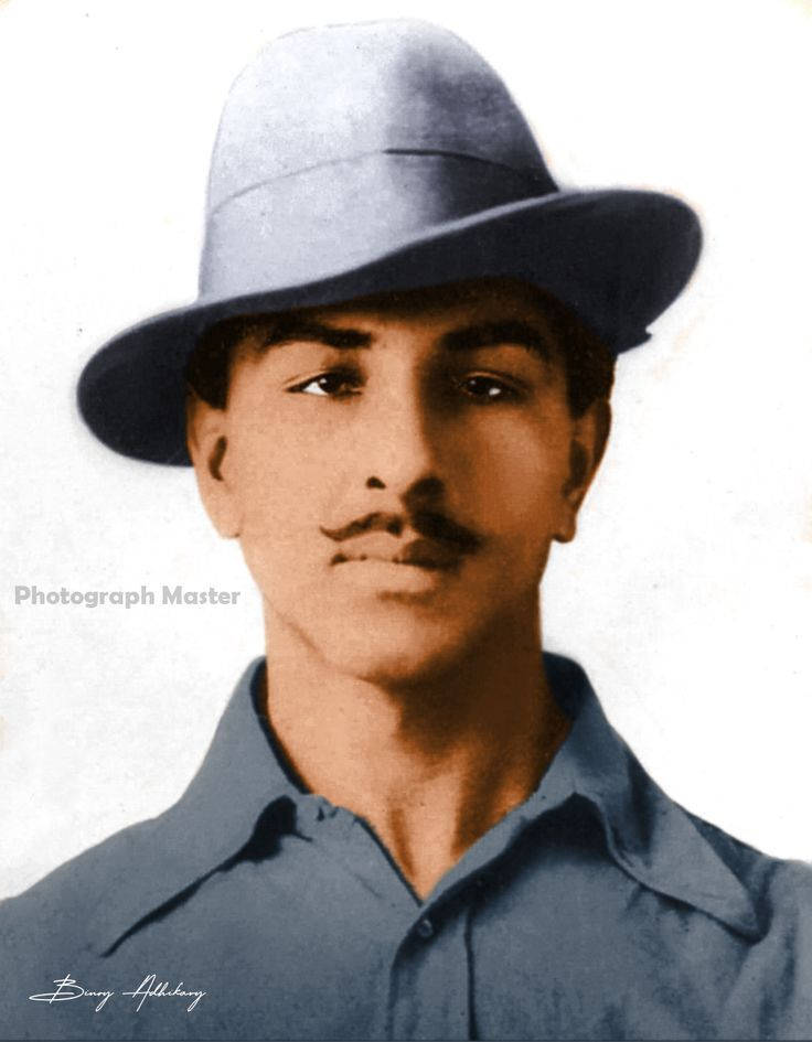 Shaheed Bhagat Singh 桌布 壁紙 — 一幅復古肖像，一位留鬍鬚的年輕男子戴著灰色軟呢帽，穿著相配的襯衫，背景為純白色。