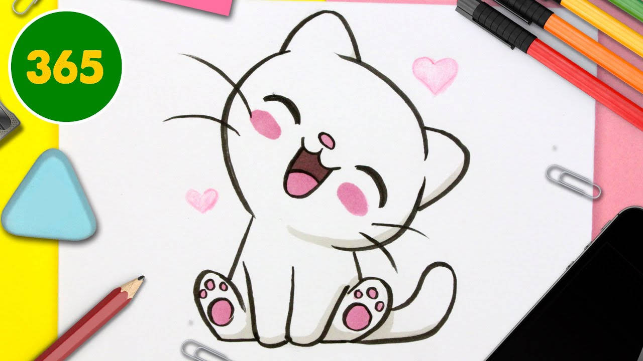 Kawaii Cute Animals 桌布 壁紙 — 一幅快樂的卡通貓咪畫作，有粉紅色的臉頰和心形圖案，周圍是色彩繽紛的書桌上的美術用品。